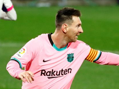 ليونيل ميسي يحتفل بتسجيله هدفاً لبرشلونة في مرمى بلد الوليد في الدوري الإسباني - 22 ديسمبر 2020 - Reuters 