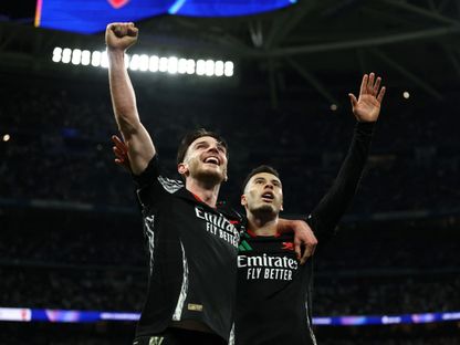 غابرييل مارتينيلي وديكلان رايس لاعبا أرسنال يحتفلان بتسجيل هدف في شباك ريال مدريد ضمن إياب ربع نهائي دوري أبطال أوروبا - 16 أبريل 2025 - REUTERS