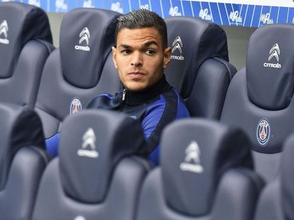 حاتم بن عرفة لاعب باريس سان جيرمان السابق - Reuters