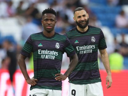 كريم بنزيما وفينيسيوس جونيور قبل مباراة بين ريال مدريد وألميريا - 29 أبريل 2023 - REUTERS
