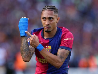 رافينيا يحتفل بهدفه الرابع في قمة برشلونة وريال مدريد بالدوري الإسباني - 11 مايو 2025 - Reuters