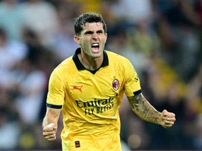 كريستيان بوليسيتش يحتفل بهدفه في مباراة ميلان وأودينيزي بالدوري الإيطالي - 20 سبتمبر 2025 - Reuters