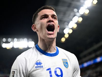 فيسنيك أسلاني يحتفل بهدفه في مباراة كوسوفو وسلوفاكيا بالملحق الأوروبي المؤهل لكأس العالم - 26 مارس 2026 - Reuters