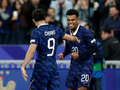 ديزيري دوي وريان شرقي يحتفلان بعد هدف فرنسا أمام بلجيكا بدوري الأمم الأوروبية - 5 أكتوبر 2026 - Reuters