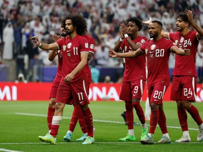 أكرم عفيف مهاجم قطر يحتفل بهدفه أمام الأردن بنهائي كأس آسيا - 10 فبراير 2024 - Reuters