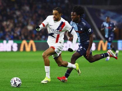 برادلي باركولا وستيفان زاغادو خلال مباراة لو هافر وباريس سان جيرمان بالدوري الفرنسي - 28 فبراير 2026 - Reuters