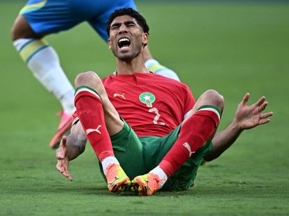 قائد المغرب أشرف حكيمي يتألم بعد تدخل من أحد لاعبي المنتخب البرازيلي في كأس العالم 2026 - 14 يونيو 2026 - Reuters