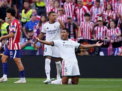 لاعبا ريال مدريد جود بيلينغهام وكيليان مبابي خلال مباراة أتلتيكو مدريد في الدوري الإسباني - 20 سبتمبر 2026 - Reuters