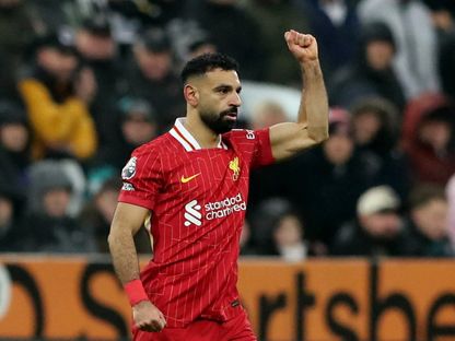 محمد صلاح نجم ليفربول يحتفل بتسجيل هدف في مرمى نيوكاسل بالدوري الإنجليزي الممتاز - 4 ديسمبر 2024 - Reuters