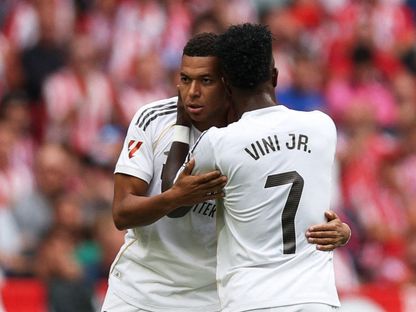 كيليان مبابي وفينيسيوس جونيور من مباراة ريال مدريد وأتلتيكو مدريد بالدوري الإسباني - 27 سبتمبر 2025 - Reuters