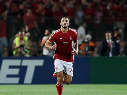 لاعب الأهلي محمد عبد المنعم يحتفل بالتسجيل في مرمى مازيمبي بإياب نصف نهائي دوري أبطال إفريقيا - 26 أبريل 2024 - ٌReuters