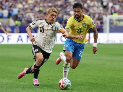 نجم منتخب اليابان ريتسو دوان في صراع على الكرة مع البرازيلي باكيتا في كأس العالم 2026 - 29 يونيو 2026 - Reuters