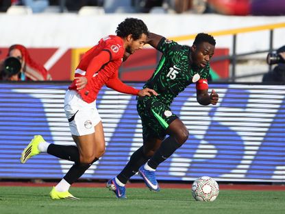 محمد هاني يطارد موسيس سيمون خلال مباراة مصر ونيجيريا لتحديد صاحب المركز الثالث بكأس أمم إفريقيا - 17 يناير 2026 - REUTERS