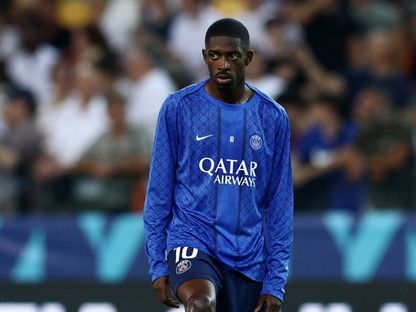 لاعب باريس سان جيرمان عثمان ديمبيلي أثناء الإحماء قبل مباراة كأس السوبر الأوروبي ضد توتنهام - 13 أغسطس 2025 - ٌReuters