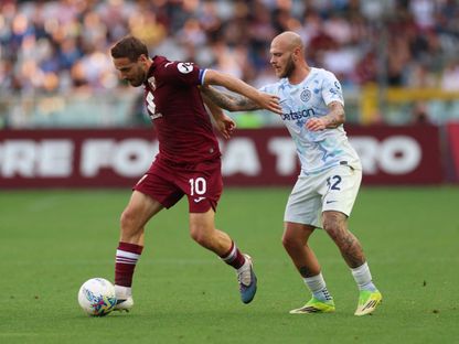 نيكولا فلاسيتش وفيديريكو ديماركو خلال مباراة تورينو وإنتر ميلان بالدوري الإيطالي - 26 أبريل 2026 - Reuters