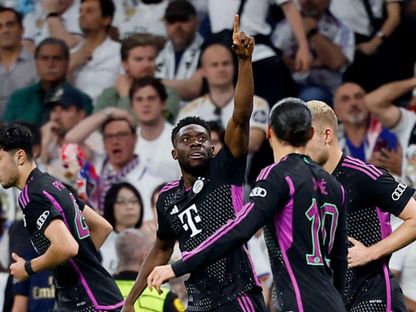 احتفال ألفونسو ديفيز بهدفه لبايرن ميونيخ أمام ريال مدريد في إياب نصف نهائي دوري أبطال أوروبا 2024 - Reuters