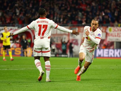 تشافي سيمونز لاعب لايبزيغ يحتفل بهدفه في شباك بوروسيا دورتموند	- 15 مارس 2025 - Reuters