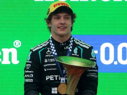 أندريا كيمي أنتونيلي يحتفل بفوزه بسباق جائزة الصين الكبرى في فورمولا 1 - 15 مارس 2026 - Reuters