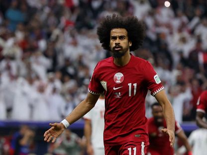 أكرم عفيف مهاجم منتخب قطر يحتفل بهدف في شباك الأردن بنهائي كأس آسيا - 10 فبراير 2024 - Reuters