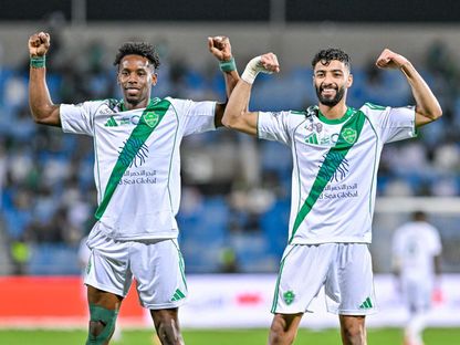 صالح أبو الشامات وريان حامد بعد فوز الأهلي على الرياض بالدوري السعودي - 26 فبراير 2026 - X/@SPA_Spor