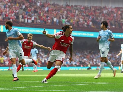 ريكاردو كالافيوري يحتفل بهدفه في مباراة أرسنال ومانشستر سيتي بكأس درع المجتمع - 16 أغسطس 2026 - Reuters