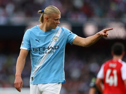 إيرلينغ هالاند مهاجم مانشستر سيتي يحتفل بعد التسجيل في مرمى أرسنال في الدوري الإنجليزي - 21 سبتمبر 2025 - Reuters