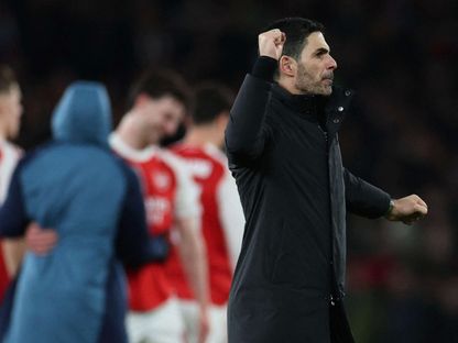 احتفال ميكيل أرتيتا بعد هزيمة ليفركوزن وتأهل أرسنال لربع نهائي دوري أبطال أوروبا - 17 مارس 2026 - Reuters