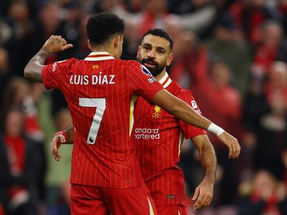 محمد صلاح نجم ليفربول يحتفل بهدفه مع لويس دياز خلال لقاء ولفرهامبتون بالدوري الإنجليزي - 2 نوفمبر 2024 - Reuters