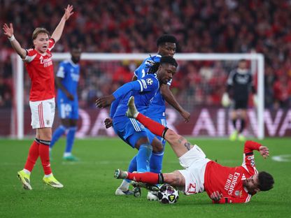 إدواردو كامافينغا وأوريليان تشواميني خلال مباراة بين ريال مدريد وبنفيكا في دوري أبطال أوروبا – 17 فبراير 2026 - REUTERS