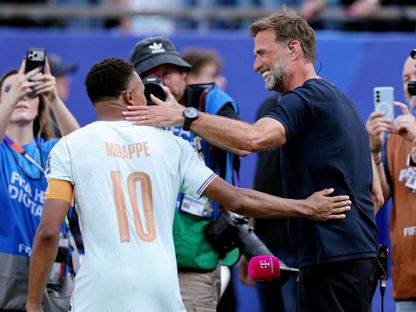 يورغن كلوب وكيليان مبابي في مباراة فرنسا والمغرب بربع نهائي كأس العالم - 9 يوليو 2026 - reuters
