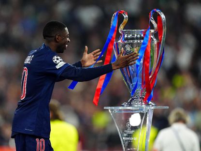 عثمان ديمبيلي يحتفل بلقب دوري أبطال أوروبا لأول مرة في مسيرته - 31 مايو 2025 - X/dembouz