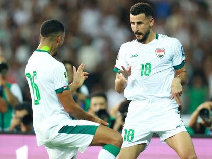 أيمن حسين (يمين الصورة) مهاجم العراق يحتفل بتسجيل هدف في مرمى عمان بتصفيات كأس العالم 2026 - 5 سبتمبر 2024 - X/@Iraq Football Association