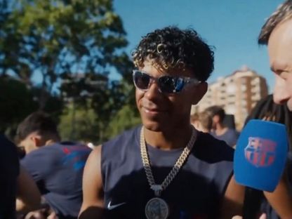 لامين يامال خلال احتفالات برشلونة بلقب الدوري الإسباني - 11 مايو 2026 - @FCBarcelona_es/x
