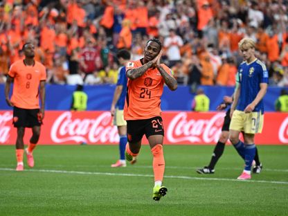 كريسينسيو سامرفيل لاعب هولندا يحتفل بهدفه أمام السويد بكأس العالم - 20 يونيو 2026 - Reuters