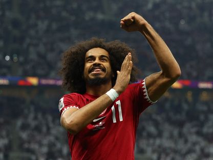 أكرم عفيف مهاجم منتخب قطر يحتفل بهدف في شباك الأردن بنهائي كأس آسيا - 10 فبراير 2024 - Reuters
