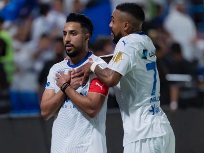 مالكوم وسالم الدوسري يحتفلان بتسجيل هدف للهلال في مرمى الفتح بدوري روشن السعودي - 16 مايو 2025 - X/@SavvyGamesGroup