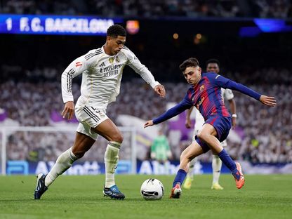 جود بيلينغهام وبيدري خلال مباراة بين ريال مدريد وبرشلونة - 26 أكتوبر 2025 - realmadrid.com