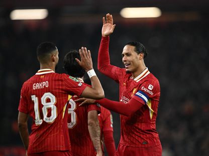 لاعبو ليفربول يحتفلون بالهدف الثالث في مرمى توتنهام في كأس رابطة الدوري - 6 فبراير 2025 - Reuters