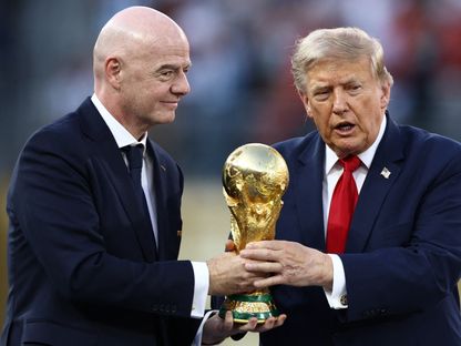 جياني إنفانتينو ودونالد ترمب بعد نهائي كأس العالم - 20 يوليو 2026 - Reuters