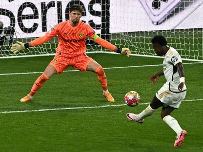 فينيسيوس جونيور يسجل هدفاً لريال مدريد في مرمى بوروسيا دورتموند بنهائي دوري أبطال أوروبا - 1 يونيو 2024 - AFP
