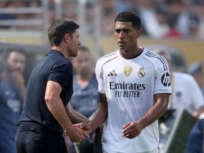 جود بيلينغهام وتشابي ألونسو من مباراة ريال مدريد وباريس سان جيرمان بكأس العالم للأندية - 9 يوليو 
2025 - Reuters