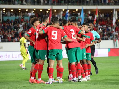 لاعبون من المغرب يحتفلون بتسجيل هدف في مرمى زامبيا بالتصفيات المؤهلة لكأس العالم - 7 يونيو 2024 - AWP