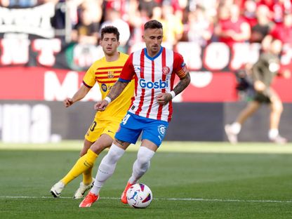 أليكس غارسيا لاعب جيرونا خلال مواجهة برشلونة في الدوري الإسباني - 4 مايو 2024 - REUTERS