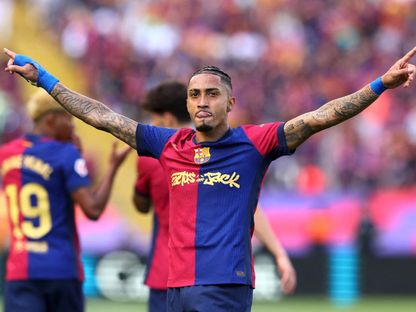 رافينيا يحتفل بتسجيله هدفاً لبرشلونة في مرمى ريال مدريد بالدوري الإسباني - 11 مايو 2025 - Reuters