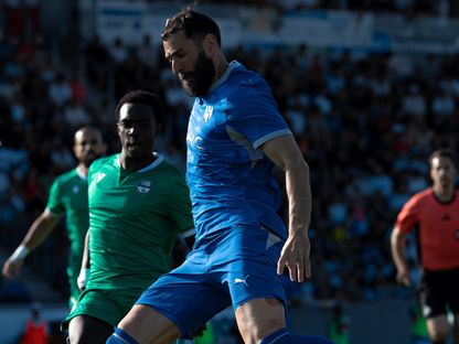 كريم بنزيما نجم الهلال خلال ودية الأهلي القطري - - X/@Alhilal_FC