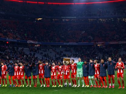 لاعبو بايرن ميونيخ يحتفلون بعد مباراة فولفسبورغ بالدوري الألماني - 11 يناير 2026 - Reuters