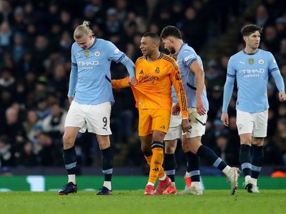 كيليان مبابي وإيرلينغ هالاند خلال لقاء ريال مدريد ومانشستر سيتي بدوري أبطال أوروبا - 11 فبراير 2025 - Reuters