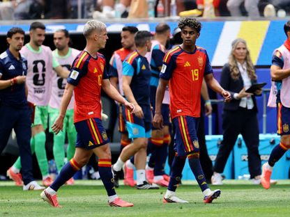 لامين يامال وداني أولمو خلال مباراة إسبانيا وبلجيكا بكأس العالم - 10 يوليو 2026 - Reuters