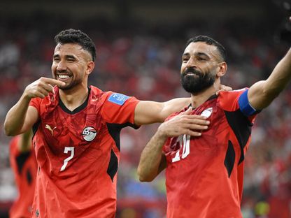 محمود تريزيغيه يحتفل بهدفه مع محمد صلاح خلال مباراة مصر ونيوزيلندا بكأس العالم - 22 يونيو 2026 - Reuters