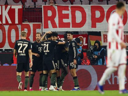 لاعبو بايرن يحتفلون بهدف كيم مين جاي أمام كولن في الدوري الألماني - 14 يناير 2026 - Reuters